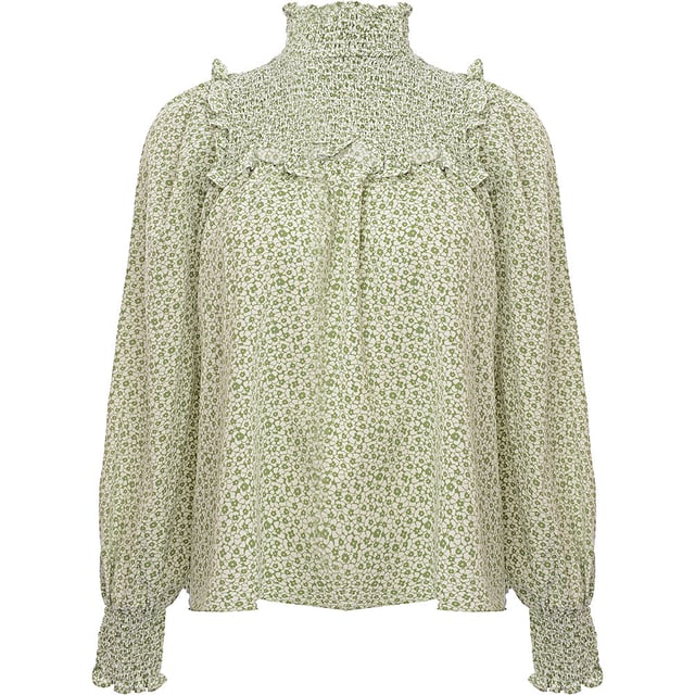 Body: 100% Polyester. A glamorous high neck smock blouse in green floral is the perfect statement piece for any wardrobe. The 100% polyester fabric ensures a comfortable fit and easy care, making it a practical choice for both day-to-day wear and special occasions. Its vibrant green floral pattern exudes a fresh and lively vibe, ideal for those who want to add a touch of nature-inspired elegance to their outfit. Whether paired with jeans for a casual look or a skirt for a more formal ensemble, this blouse is sure to turn heads and elevate any look.