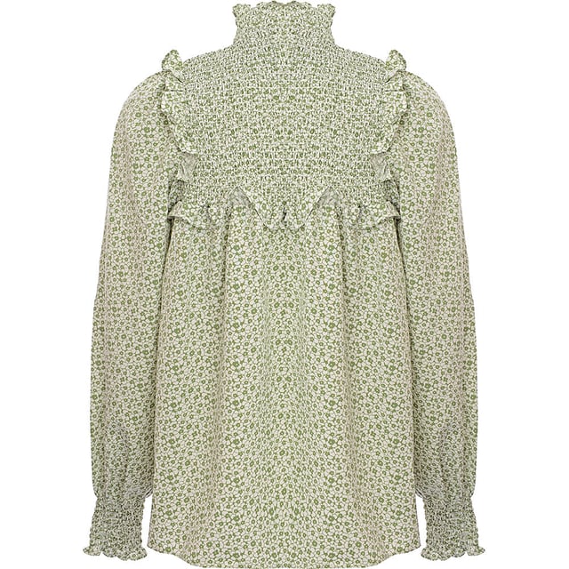 Body: 100% Polyester. A glamorous high neck smock blouse in green floral is the perfect statement piece for any wardrobe. The 100% polyester fabric ensures a comfortable fit and easy care, making it a practical choice for both day-to-day wear and special occasions. Its vibrant green floral pattern exudes a fresh and lively vibe, ideal for those who want to add a touch of nature-inspired elegance to their outfit. Whether paired with jeans for a casual look or a skirt for a more formal ensemble, this blouse is sure to turn heads and elevate any look.