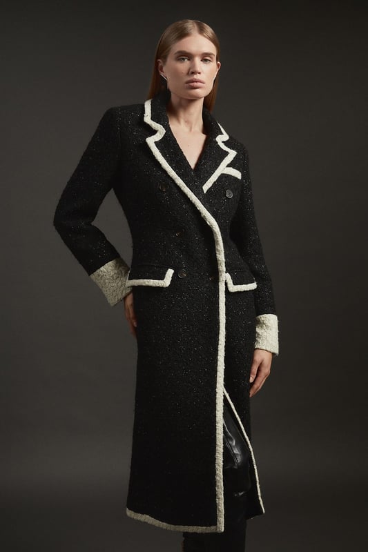 Feel elevated no matter the weather in our midi length coat, featuring a traditional, double breasted design, and contrasting trim details. Wear it over any outfit, whether heading out for dinner or to the office. Texture Metallic Contrast Tipped Double Breasted Tailored Midi Coat Flattering Straight Silhouette Classic Double Breasted Design V Neckline Unique Cape Accent Contrast Detailing Midi LengthShop this seasons women's long coats and jackets or browse the full collection of coats and jackets now.