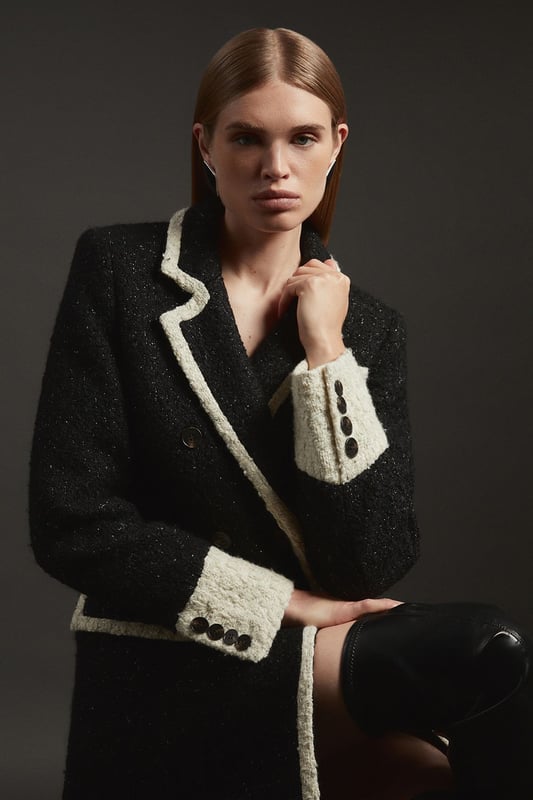 Feel elevated no matter the weather in our midi length coat, featuring a traditional, double breasted design, and contrasting trim details. Wear it over any outfit, whether heading out for dinner or to the office. Texture Metallic Contrast Tipped Double Breasted Tailored Midi Coat Flattering Straight Silhouette Classic Double Breasted Design V Neckline Unique Cape Accent Contrast Detailing Midi LengthShop this seasons women's long coats and jackets or browse the full collection of coats and jackets now.