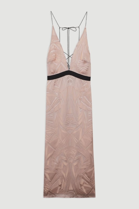 Architectural influences, brought to life through print; Karen Millen presents a new collection in collaboration with Amelia Graham. Elevate your occasion wear wardrobe with our occasion dress, with a figure hugging bodice which flows into a straight skirt, a halter neckline with strappy detailing, and a low back. Style it with strappy heels for an occasion look that is guaranteed to turn heads wherever you step. Amelia Graham Burnout Lace Up Detail Woven Column Dress High Quality Lace Fabric Figure Hugging Fit Straight Hanging Skirt Striking Strappy Back Lace-Up Bust Accent Belted Waistline Tie Back FasteningDiscover this seasons lace dresses or browse the full collection of women's dresses now.