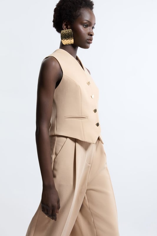 Elevate your top selection with our waistcoat, with a figure hugging fit, and buttons down the front. This piece pairs well with anything, from matching separates, to tailored trousers, to jeans for an elevated look that will take you seamlessly from day to night. Essential Tailored Button Through Waistcoat Classic Waistcoat Style V Neckline Fitted Silhouette Sleek, Minimal Design Button Front Fastening Matching Trousers Sold Separately