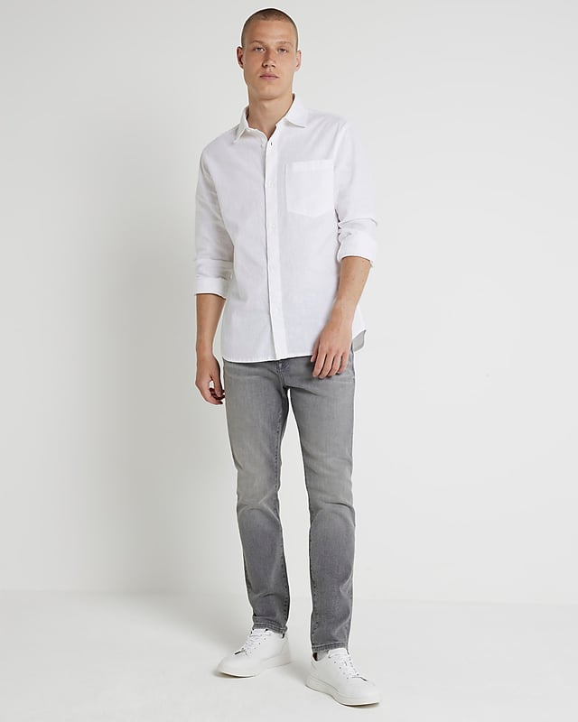 Skinny fit, Denim fabric, Classic 5 pockets, Belt loops, Button fastening, Cotton for this product has been more responsibly sourced