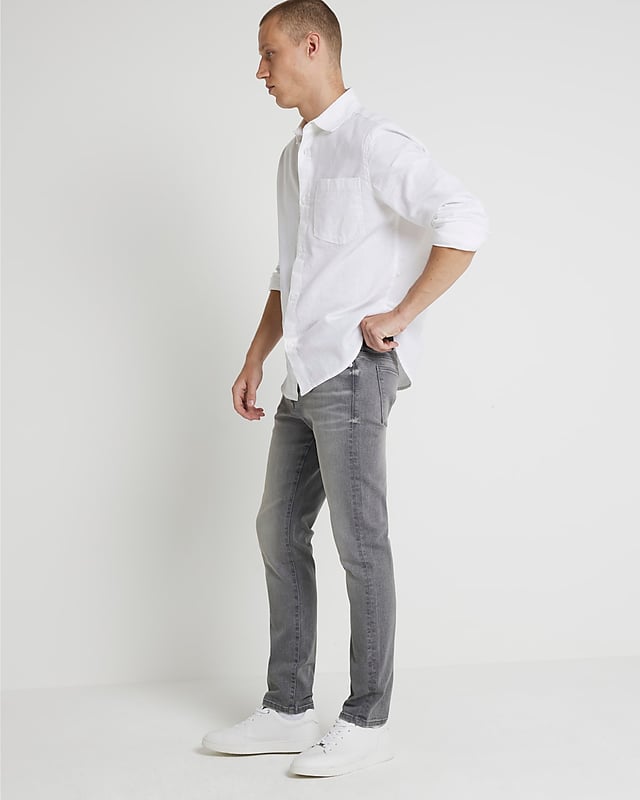 Skinny fit, Denim fabric, Classic 5 pockets, Belt loops, Button fastening, Cotton for this product has been more responsibly sourced
