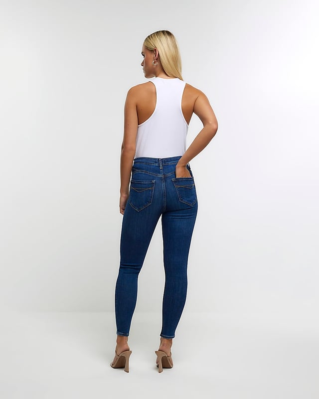 Petite collection, High waisted, Skinny fit, Denim fabric, Lift and shaping seams to fit and contour, Belt loops, Classic 5 pockets, Button and zip fastening, Cotton for this product has been responsibly sourced