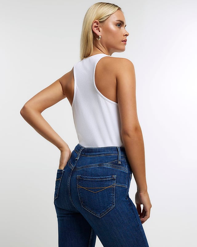 Petite collection, High waisted, Skinny fit, Denim fabric, Lift and shaping seams to fit and contour, Belt loops, Classic 5 pockets, Button and zip fastening, Cotton for this product has been responsibly sourced