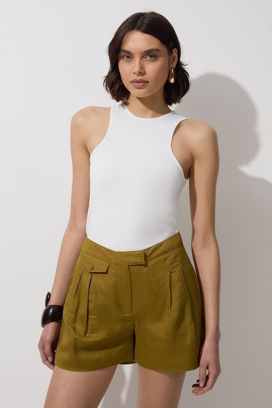 Elevate your warm weather wardrobe in our shorts, with a wide leg silhouette, a statement print, and pockets. The lightweight linen fabric makes for a piece perfect for wearing from wandering city streets to lounging at the beach. Style it with anything, from the matching shirt for an elevated look that will take you seamlessly from day to night, to a T-shirt for a more relaxed approach. Viscose Linen Woven Pocket Detail Short High Quality Linen Fabric Flattering Relaxed Fit Comfortable High Waistline Pocket Features Deep Pocket Features Matching Pieces Sold Separately