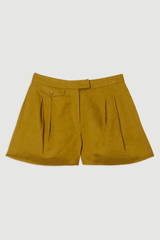 Elevate your warm weather wardrobe in our shorts, with a wide leg silhouette, a statement print, and pockets. The lightweight linen fabric makes for a piece perfect for wearing from wandering city streets to lounging at the beach. Style it with anything, from the matching shirt for an elevated look that will take you seamlessly from day to night, to a T-shirt for a more relaxed approach. Viscose Linen Woven Pocket Detail Short High Quality Linen Fabric Flattering Relaxed Fit Comfortable High Waistline Pocket Features Deep Pocket Features Matching Pieces Sold Separately