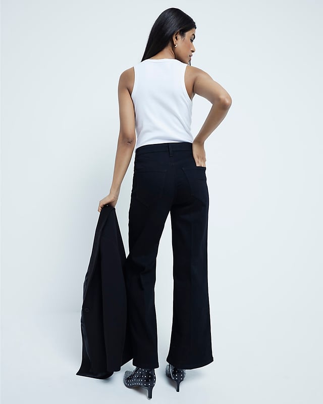 High rise, Button and zip fastening, Pocket detail, Wide leg