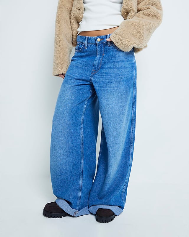 Petite collection, Denim fabric, Button and zip fastening, Belt loops, Pocket detail, Super wide leg