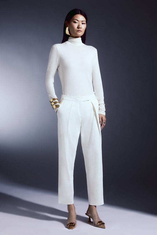 A true contender for the perfect work-to-weekend trousers, this polished pair is tailored for sleek effect. Elegantly equipped with slip pockets, a fly fastening and a relaxed fit, these plush tailored trousers breathe new life into any well-kept capsule collection.TailoredRelaxed FitRegular LengthSlip pockets