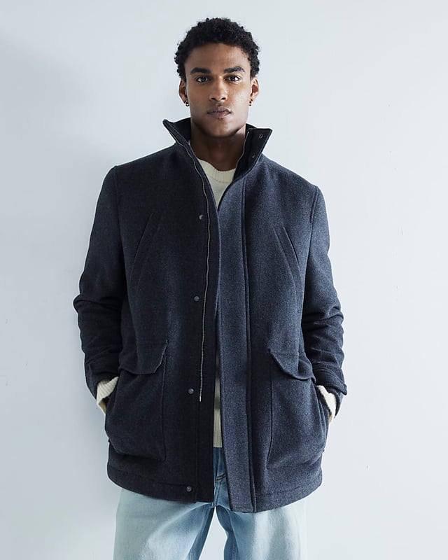 Regular fit, Wool fabric, Chest and waist pockets, Collared, Long sleeves, Zip fastening