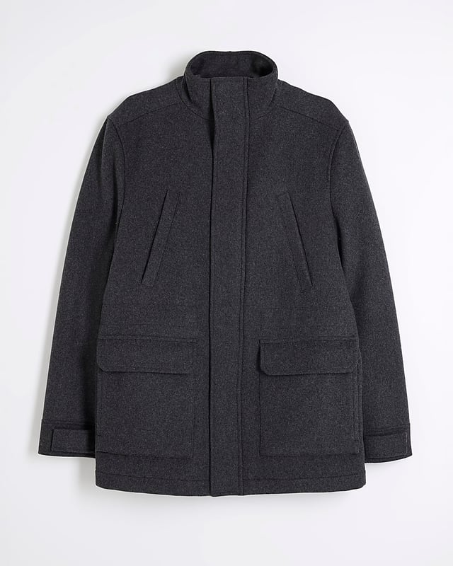Regular fit, Wool fabric, Chest and waist pockets, Collared, Long sleeves, Zip fastening