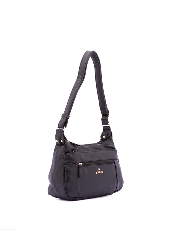 Bolso bandolera para mujer. El cierre es con cremallera. Los bolsillos internos son uno con cremallera y dos abiertos. Los bolsillos externos son dos delanteros con cremallera y uno trasero con cremallera. Falta la correa para el hombro. El asa es regulable en ecopiel. Hay dos compartimentos internos. El material exterior es ecopiel. Internamente está forrado en poliéster. Medidas: 30x20x10 cm. Producto de moda