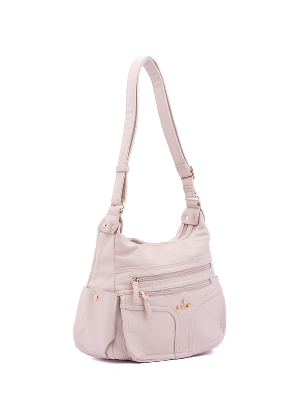 Bolso bandolera para mujer. El cierre es con cremallera. Los bolsillos internos son uno con cremallera y dos abiertos. Los bolsillos externos son dos frontales con cremallera, dos laterales con botón magnético y uno trasero con cremallera. Falta la correa para el hombro. El asa es regulable en ecopiel. Hay dos compartimentos internos. El material exterior es ecopiel. Internamente está forrado en poliéster. Medidas: 33x25x14 cm. Producto de moda
