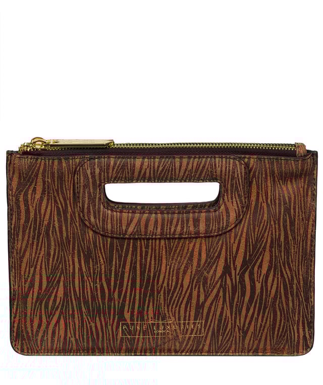 The 'Esher' clutch bag from Pure Luxuries London is handcrafted from luxurious natural leather with a beautifully suede finish. The dual zips, above the built-in handles, secure the dual compartments that come lined with natural, untreated 100% cotton. Additional storage space is provided by a central slip pocket between the zipped compartments, ideal for on-the-go storage. Adorned with the iconic Pure Luxuries London gold foil embossed logo as the perfect finishing touch.