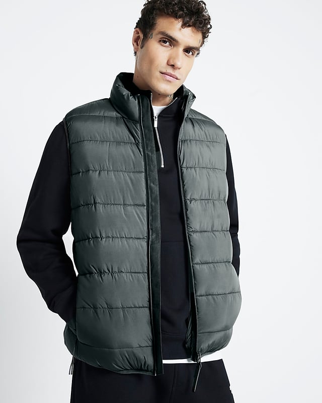 Regular fit, Quilted, Side slip pockets, High neck, Sleeveless, Zip fastening