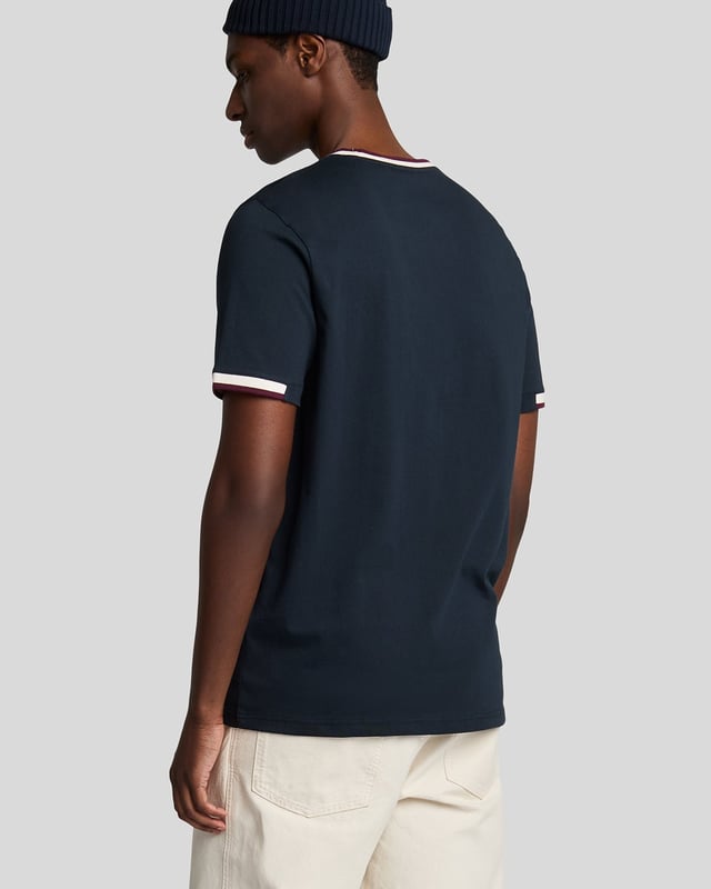 Introducing the Half Tipped T-Shirt, an exquisite addition to our Legacy range of short sleeve apparel. This refined piece is designed with a tipped contrast collar and half-tipped cuffs, imparting a distinctive flair that elevates casual elegance. Crafted from 100% premium cotton, it ensures comfort while showcasing a golden embroidered eagle on the top left chest, symbolizing sophistication.

- Composition: 100% Cotton
- Fit: Regular
- Logo Branding: Golden embroidered eagle
- Logo Branding Garment Location: Top left chest
- Versatile styling for both casual and semi-formal occasions

Elevate your spring menswear collection with this distinguished t-shirt, epitomizing modern style and timeless luxury.