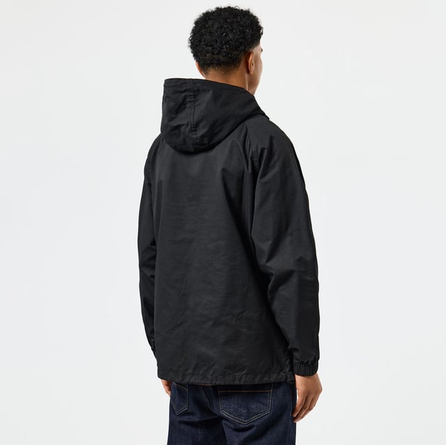 Mens Weekend Offender Piotti Smock Over-Top in black.- Three piece hood with adjustable  internal drawcord.- Centre front 1-4 zip with WO branded zip puller and zip guard.- Angled side entry welt pockets with concealed press stud fastening.- Elasticated cuffs.- Adjustable drawcord to hem.- Detachable WO badge to sleeve.- Regular fit.- Shell: 100% Cotton. Mesh Lining: 100% Polyester.- Ref: OTAW2401BK