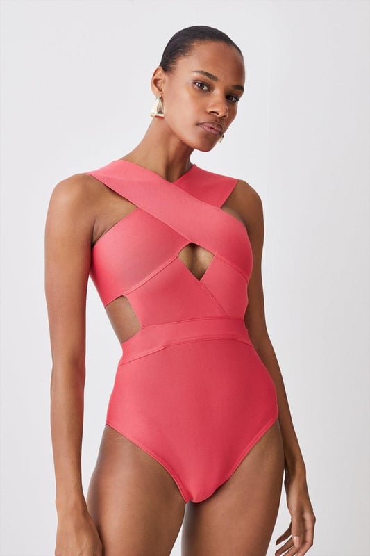 Whilst appropriate for a beach destination, please note that in order to ensure enduring quality, this piece is not recommended for swimming.Style: Cut Out SwimsuitDesign: Plain