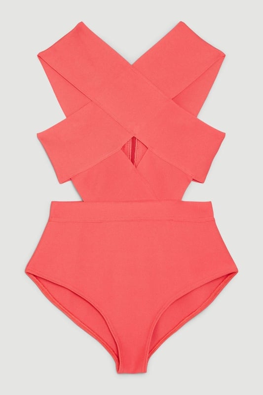 Whilst appropriate for a beach destination, please note that in order to ensure enduring quality, this piece is not recommended for swimming.Style: Cut Out SwimsuitDesign: Plain