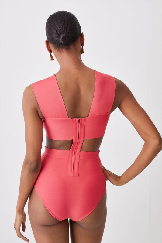 Whilst appropriate for a beach destination, please note that in order to ensure enduring quality, this piece is not recommended for swimming.Style: Cut Out SwimsuitDesign: Plain