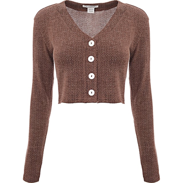 Body: 50% Polyester, Body: 45% Viscose, Body: 5% Elastane Stay cozy and stylish with the Glamorous relaxed cropped cardigan in a beautiful brown melange knit. Made from a blend of 50% polyester, 45% viscose, and 5% elastane, this cardigan offers a soft and comfortable fit with a touch of stretch. The relaxed silhouette and cropped length make it perfect for layering over your favorite tops and dresses. The brown melange knit adds a warm and textured look, making this cardigan a versatile addition to your wardrobe. Pair it with high-waisted jeans or a skirt for a chic and effortless outfit.