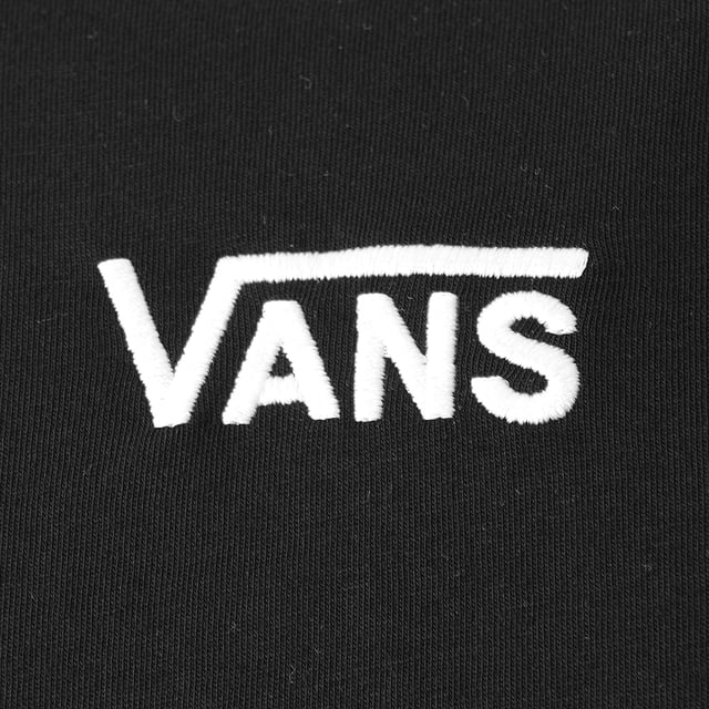 Imagine a striking t-shirt design that captures the essence of rebellion and edginess. The 'Vans Still Burning' back print t-shirt in black features bold white lettering, making a statement that stands out. At the center, a white skull with candles emerging from the top adds a touch of the macabre, while the contrast of the yellow flame brings a vibrant pop of color. This design is not just clothing; it's a declaration of individuality and fearless style.
