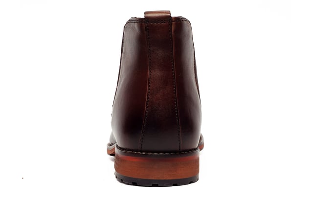 Introducing the high-end Argyll Leather Chelsea Boot for menwhere timeless craftsmanship meets modern sophistication. Made from premium leather, these boots offer a sleek, slip-on design with classic elasticated side panels and a convenient pull-tab for effortless wear. The durable rubber sole provides superior traction, making them a versatile choice for both casual and semi-formal occasions. 
 Whether styled with jeans or tailored trousers, the Argyll boot seamlessly transitions from day to night, ensuring a polished look for any setting.
 - Leather Upper
 - Slip on design
 - Elasticated side gussets
 - Leather heel pull
 - Treaded rubber sole