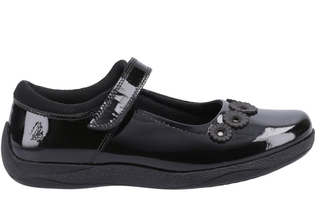 Hush Puppies Christina Senior School Shoes The Christina Senior School Shoe combines elegance and practicality with its classic design. Featuring a simple touch fastening strap for easy wear, the enhanced heel guard provides extra scuff protection, while decorative flowers at the toe add a charming touch. The double-dyed real leather upper helps reduce scuff marks, and the breathable textile sock and Micro-Fresh lining keep feet fresh and comfortable. With a durable outsole and 1.8cm heel, the Christina shoe is perfect for school days that demand both style and durability.- Patent leather upper
- Micro-Fresh textile lining
- Touch fastening strap
- Hardwearing and durable outsole
- Heel height of 1.8cm
- Hush Puppies branding