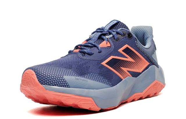 Designed for high performance all terrain trail runners, these New Balance DynaSoft Nitrel v6 Running Shoes offer the perfect combination of comfort, durability, and versatility. These all terrain running shoes are built for those who embrace an active outdoor running regime, seamlessly transitioning between rugged trails and hill climbs, making them a must a must have for all runners alike.
The DynaSoft Nitrel v6 is crafted with an engineered textile mesh upper that provides exceptional breathability, allowing for optimal airflow to keep your feet cool and fresh throughout your run. The perforated design enhances ventilation by promoting the escape of heat and moisture, reducing discomfort and preventing sweat buildup. This breathable construction ensures your feet stay dry, even during intense runs.
For added durability and protection, the shoe features no-sew overlays that enhance structural integrity while providing a sleek, irritation-free fit. These overlays eliminate unnecessary seams, reducing the risk of chafing and discomfort, ensuring a smoother running experience. Additionally, a reinforced toe protector shields against impact from rocks, roots, and uneven terrain, providing extra security on rough trails. The traditional lace-up closure ensures a snug, adjustable fit, offering enhanced support and a locked-in feel so you can move with confidence.

- NEW IN  2025 MODEL & COLOUR
- Textile / Mesh upper
- DynaSoft cushioned midsole
- Heel loop = Easy on / off wear
- Adjustable lace closure
-Comfort cushioned insole
- Rugged AT Tread outsole
- Soft padded heel & ankle collar
- New Balance branding