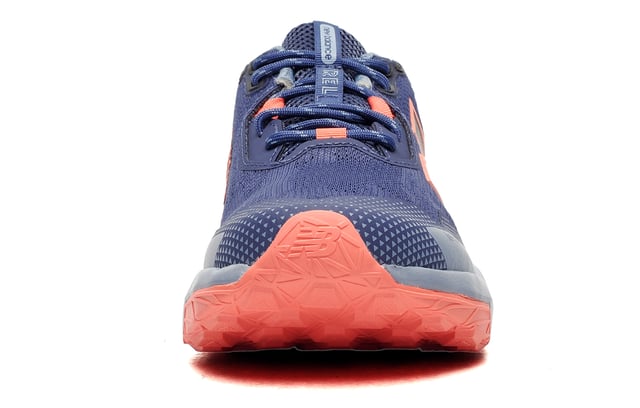 Designed for high performance all terrain trail runners, these New Balance DynaSoft Nitrel v6 Running Shoes offer the perfect combination of comfort, durability, and versatility. These all terrain running shoes are built for those who embrace an active outdoor running regime, seamlessly transitioning between rugged trails and hill climbs, making them a must a must have for all runners alike.
The DynaSoft Nitrel v6 is crafted with an engineered textile mesh upper that provides exceptional breathability, allowing for optimal airflow to keep your feet cool and fresh throughout your run. The perforated design enhances ventilation by promoting the escape of heat and moisture, reducing discomfort and preventing sweat buildup. This breathable construction ensures your feet stay dry, even during intense runs.
For added durability and protection, the shoe features no-sew overlays that enhance structural integrity while providing a sleek, irritation-free fit. These overlays eliminate unnecessary seams, reducing the risk of chafing and discomfort, ensuring a smoother running experience. Additionally, a reinforced toe protector shields against impact from rocks, roots, and uneven terrain, providing extra security on rough trails. The traditional lace-up closure ensures a snug, adjustable fit, offering enhanced support and a locked-in feel so you can move with confidence.

- NEW IN  2025 MODEL & COLOUR
- Textile / Mesh upper
- DynaSoft cushioned midsole
- Heel loop = Easy on / off wear
- Adjustable lace closure
-Comfort cushioned insole
- Rugged AT Tread outsole
- Soft padded heel & ankle collar
- New Balance branding