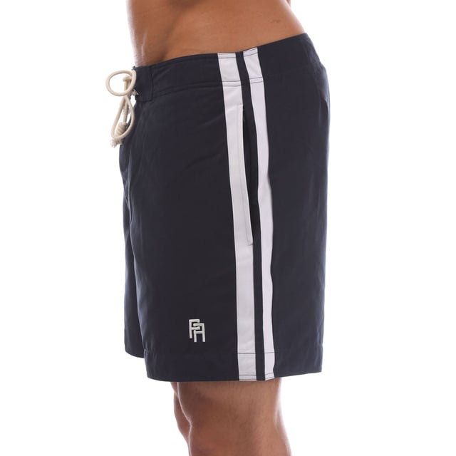 Mens Palm Angels Monogram Swim Shorts in navy - white.- Elasticated waistband with drawstring.- Side pockets.- Back pockets.- Brand's monogram on the hem.- Relaxed fit.- 100% Polyester.- Ref: PMFA0090014601