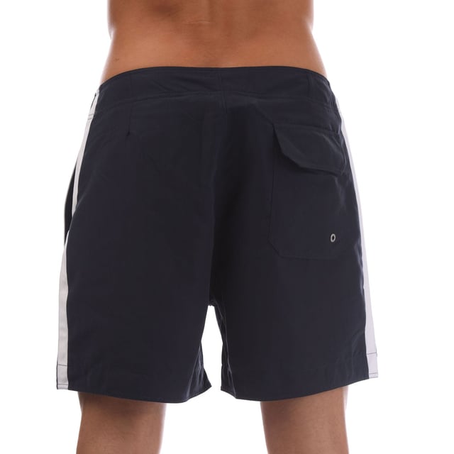 Mens Palm Angels Monogram Swim Shorts in navy - white.- Elasticated waistband with drawstring.- Side pockets.- Back pockets.- Brand's monogram on the hem.- Relaxed fit.- 100% Polyester.- Ref: PMFA0090014601