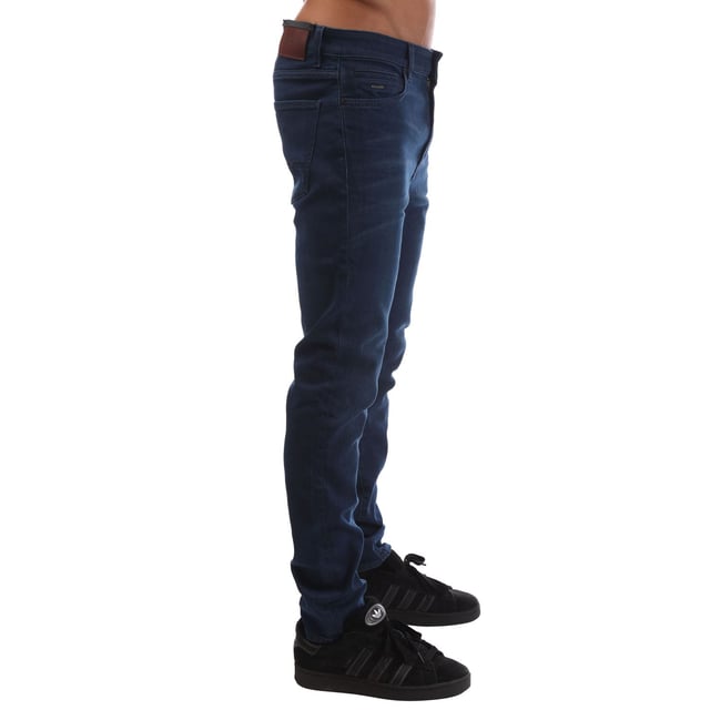 Mens BOSS Keith-1 Jeans in navy.- Five-pocket styling.- Zip fly and button fastening.- Branded waist patch.- Stretch fabric.- Tapered fit.- 81% Cotton  11% Lyocell  6% Elastomultiester  2% Elastane.- Ref: 50480285145
