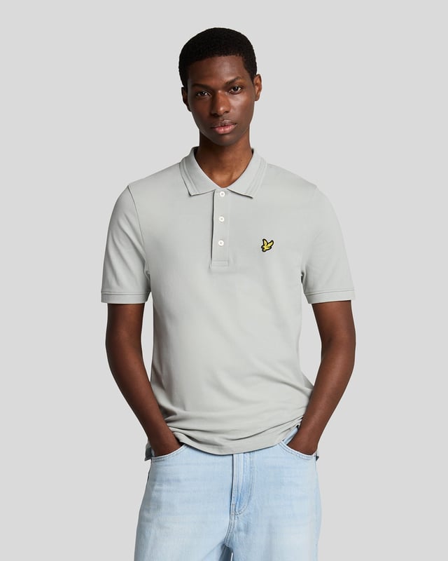 Subtle updates to our classic polo shirts keep them current. This one is cut from soft, breathable cotton-blend with added elastane for a bit of stretch. It's finished with a tipped collar and cuffs and embroidered with our emblematic eagle logo.- Classic collar 
- Front button fastening 
- Short sleeves 
- Tipped collar and cuffs
- Composition: 97% cotton, 3% elastane