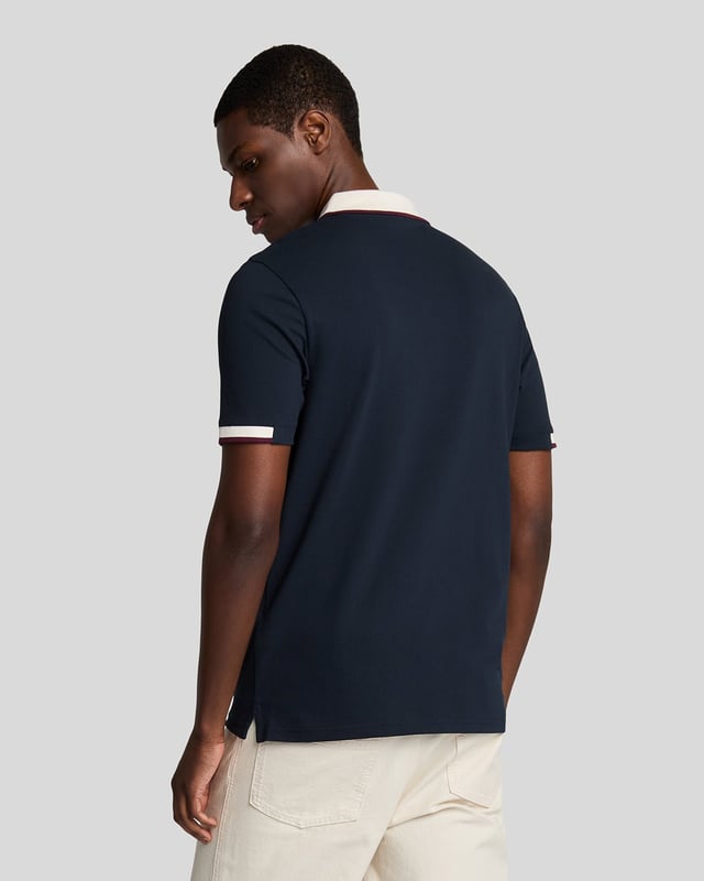 Elevate your spring menswear collection with the Half Tipped Polo Shirt, a quintessential piece that merges refinement and casual sophistication. Crafted with a premium blend of 97% cotton and 3% elastane, this shirt features meticulously designed half-tipped cuff sleeves and a stylish tipped collar, complemented by three elegant buttons. Adorned with a golden embroidered eagle on the left chest, it showcases a signature touch of luxury for the modern gentleman.

- Composition: 97% Cotton, 3% Elastane 
- Fit: Regular 
- Logo Branding: Golden embroidered eagle 
- Garment Location: Left chest 
- Styling Versatility: Perfect for both casual outings and refined gatherings 

Indulge in a garment that epitomizes elegance and versatility, making it a must-have addition to any discerning wardrobe this spring.