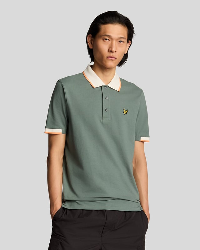 Elevate your spring menswear collection with the Half Tipped Polo Shirt, a quintessential piece that merges refinement and casual sophistication. Crafted with a premium blend of 97% cotton and 3% elastane, this shirt features meticulously designed half-tipped cuff sleeves and a stylish tipped collar, complemented by three elegant buttons. Adorned with a golden embroidered eagle on the left chest, it showcases a signature touch of luxury for the modern gentleman.

- Composition: 97% Cotton, 3% Elastane 
- Fit: Regular 
- Logo Branding: Golden embroidered eagle 
- Garment Location: Left chest 
- Styling Versatility: Perfect for both casual outings and refined gatherings 

Indulge in a garment that epitomizes elegance and versatility, making it a must-have addition to any discerning wardrobe this spring.