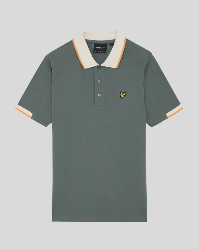 Elevate your spring menswear collection with the Half Tipped Polo Shirt, a quintessential piece that merges refinement and casual sophistication. Crafted with a premium blend of 97% cotton and 3% elastane, this shirt features meticulously designed half-tipped cuff sleeves and a stylish tipped collar, complemented by three elegant buttons. Adorned with a golden embroidered eagle on the left chest, it showcases a signature touch of luxury for the modern gentleman.

- Composition: 97% Cotton, 3% Elastane 
- Fit: Regular 
- Logo Branding: Golden embroidered eagle 
- Garment Location: Left chest 
- Styling Versatility: Perfect for both casual outings and refined gatherings 

Indulge in a garment that epitomizes elegance and versatility, making it a must-have addition to any discerning wardrobe this spring.