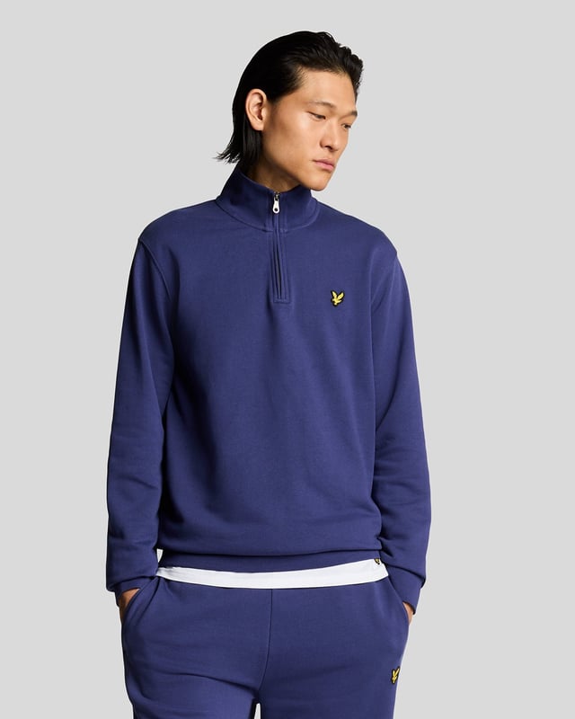 Made from loopback cotton jersey with a good element of stretch, our quarter zip sweatshirt is the perfect layering piece for every season. It features a classic collar and a quarter zip fastening at the front, and is finished with our signature golden eagle logo on the chest. - Classic collar 
- Quarter zip fastening 
- Long sleeves
- Composition: 100% cotton