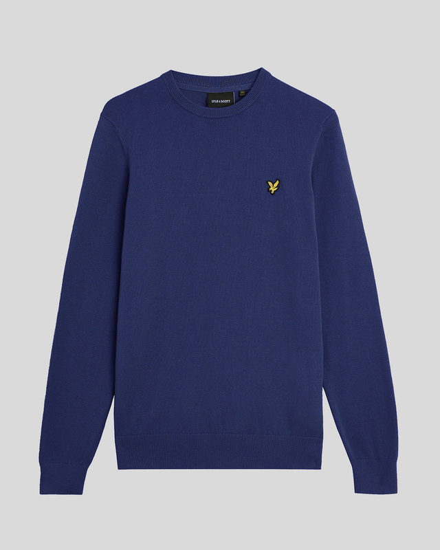 We know the value of a well-made staple, so classic pieces like this jumper form the core of our Lyle &amp; Scott collections. It's been knitted from soft 100% cotton and has a slim fit – perfect for layering under a jacket.- Round neck 
- Long sleeves 
- Ribbed hemline, cuffs and neckline
- Composition: 100% cotton