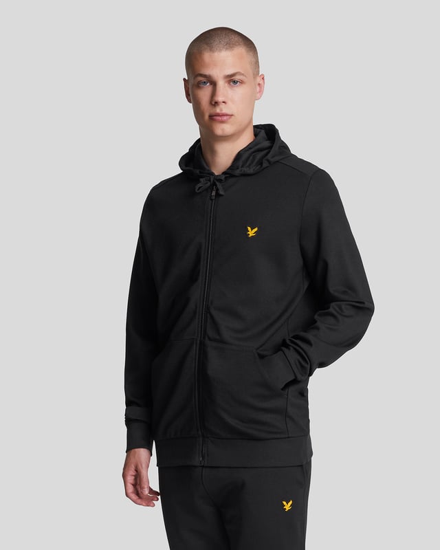 Unser Full-Zip Fly Fleece Hoodie aus leichter und weicher Viskose ist eine modernere, sportlichere Version des klassischen Zip-Up-Hoodies mit zusätzlichem Stretch.– 70 % Viskose, 22 % Polyamid, 8 % Elastan– Durchgehender, farblich abgestimmter Reißverschluss mit Gummispitze– Dicker Kordelzug– 360 g/m² Stoff– Locker geschnittene Bündchen und Saum– Eingesetzte Ärmel– Geteilte Kängurutasche
