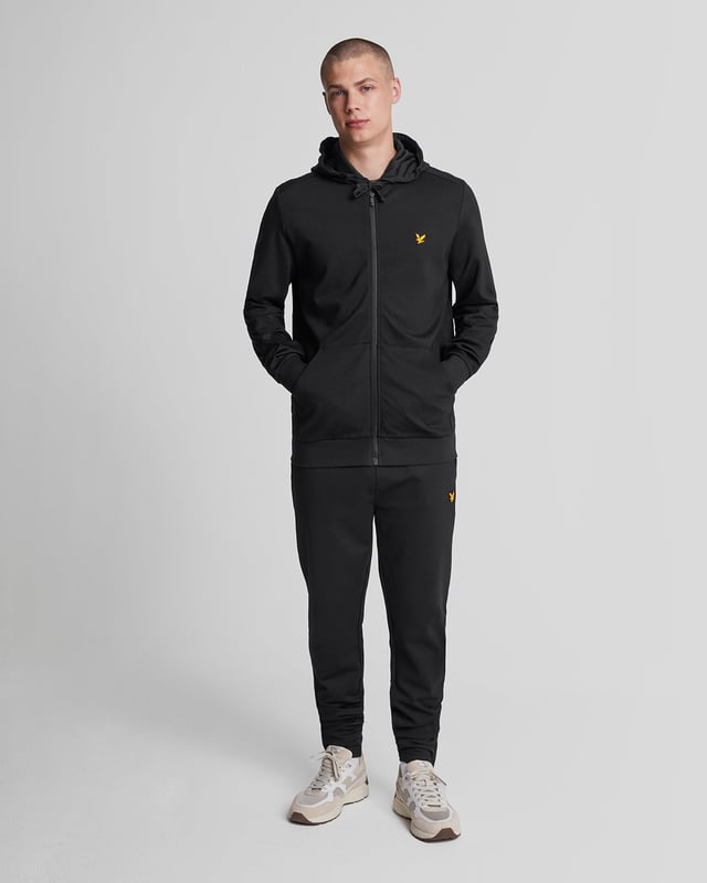 Unser Full-Zip Fly Fleece Hoodie aus leichter und weicher Viskose ist eine modernere, sportlichere Version des klassischen Zip-Up-Hoodies mit zusätzlichem Stretch.– 70 % Viskose, 22 % Polyamid, 8 % Elastan– Durchgehender, farblich abgestimmter Reißverschluss mit Gummispitze– Dicker Kordelzug– 360 g/m² Stoff– Locker geschnittene Bündchen und Saum– Eingesetzte Ärmel– Geteilte Kängurutasche