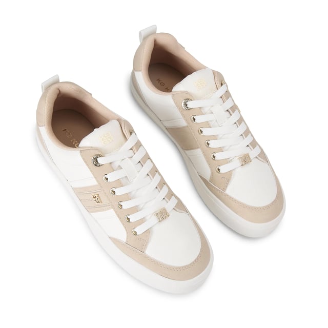 The KG Kurt Geiger Lindsey is a lace up sneaker crafted in taupe and white. There are gold tone branding details seen across the upper.