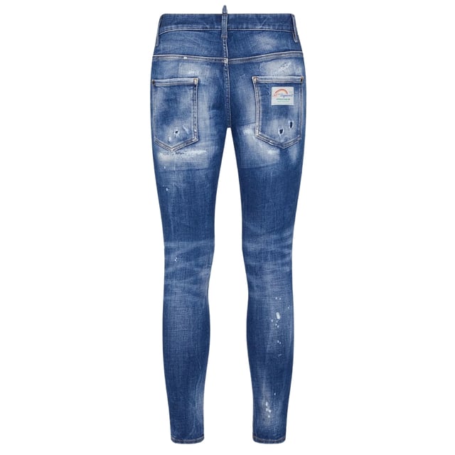Estilo vaquero súper twinky, mezclilla elástica 93 % algodón, 4 % poliéster, 3 % elastano, bragueta de botones, corte ceñido con pierna cónica, diseño rasgado, detalle de salpicaduras de pintura, mezclilla reforzada desgastada, jeans azules