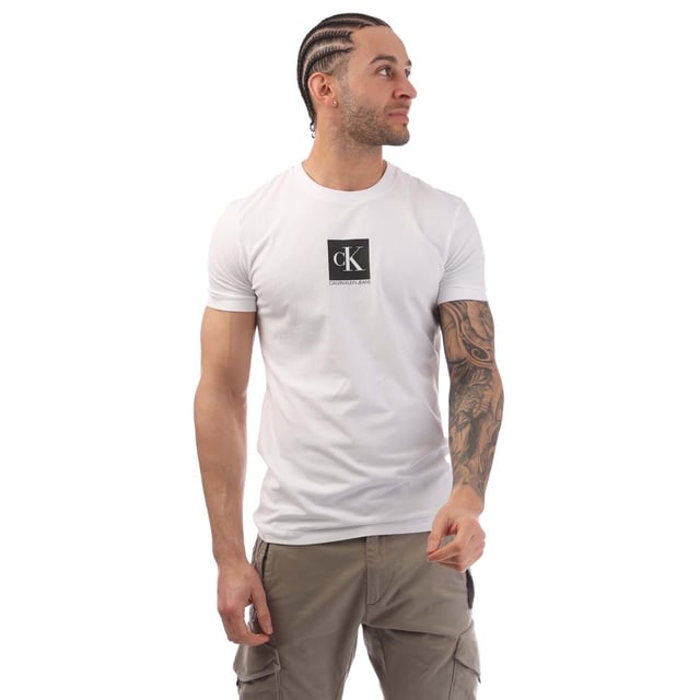 Mens Calvin Klein Jeans Slim Organic Cotton Logo T-Shirt in bright white.- Ribbed crew neck.- Short sleeves. - Calvin Klein monogram logo printed at centre chest.- Tonal Calvin Klein monogram logo at left cuff.- Soft organic cotton stretch jersey construction.- Slim fit. - 94% Organic cotton  6% Elastane.  Machine washable.- Ref: J30J314755YAF