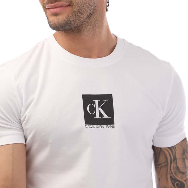 Mens Calvin Klein Jeans Slim Organic Cotton Logo T-Shirt in bright white.- Ribbed crew neck.- Short sleeves. - Calvin Klein monogram logo printed at centre chest.- Tonal Calvin Klein monogram logo at left cuff.- Soft organic cotton stretch jersey construction.- Slim fit. - 94% Organic cotton  6% Elastane.  Machine washable.- Ref: J30J314755YAF