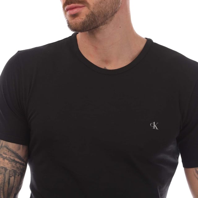 Mens Calvin Klein 2 Pack of Essential Crew T-Shirts in black.- Crew neck.- Short sleeves.- Printed branding.- Soft cotton stretch.- 95% Cotton  5% Elastane.- Ref: 000NB2221A001