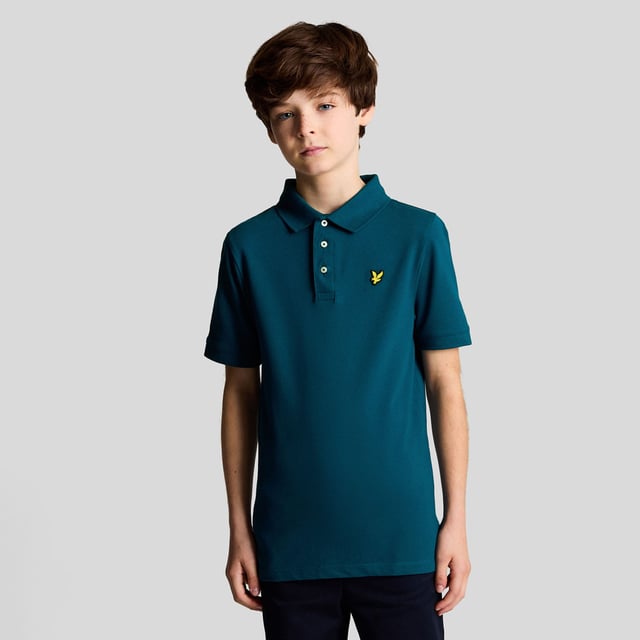 Juniors Lyle And Scott Plain Polo Shirt in navy.- Classic ribbed collar.- Three button placket with detail stitching.- Short sleeves.- Ribbed cuffs.- Embroidered logo on chest.- Regular fit.- 97% Cotton  3% Elastane.- Ref: SPB2000VW992