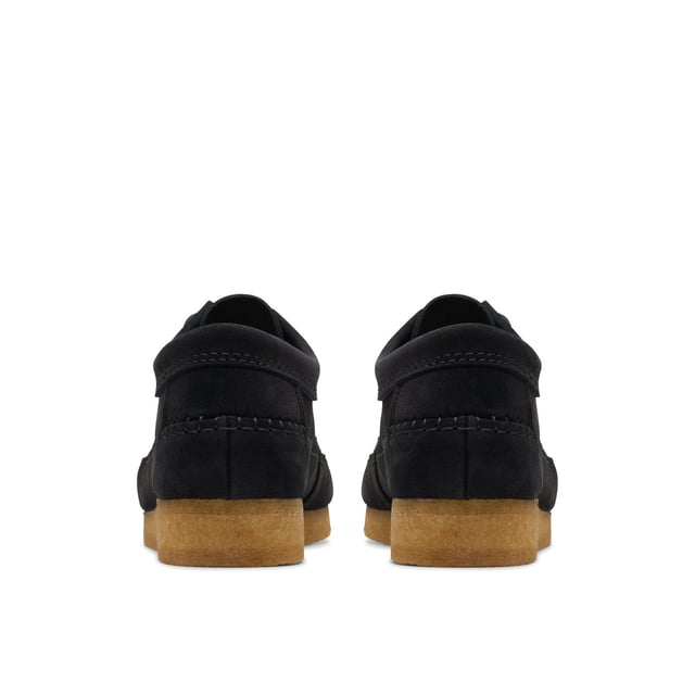 An iconic casual shoe-trainer hybrid  our classic Weaver channels on-trend 70s Americana nostalgia. Butter-soft suede in ultra-wearable black and a crafted construction create a vintage look  while a natural pebble sole and Clarks Originals fobs act as a marker of our quality craftsmanship.Premium black suede upperNatural rubber pebble crepe soleFinished with two Clarks Originals fobs